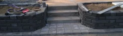 Muurikivi Beto-vallimuuri kansipari 560x200x100 mm musta